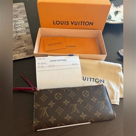 louis vuitton adele wallet discontinued